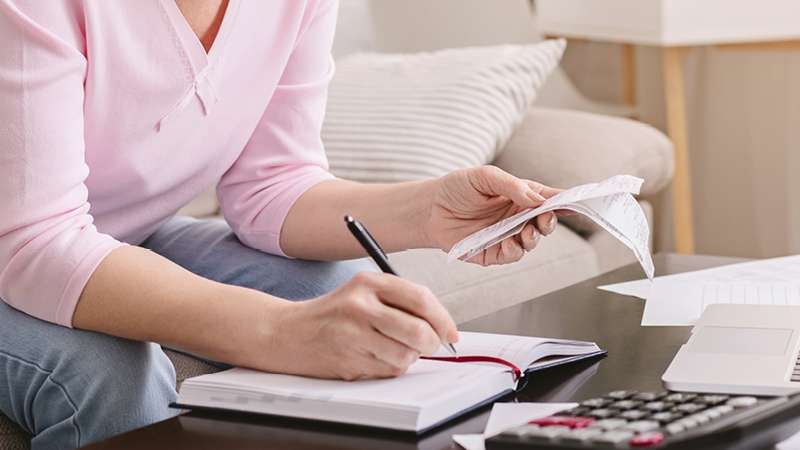 Person sitting writing