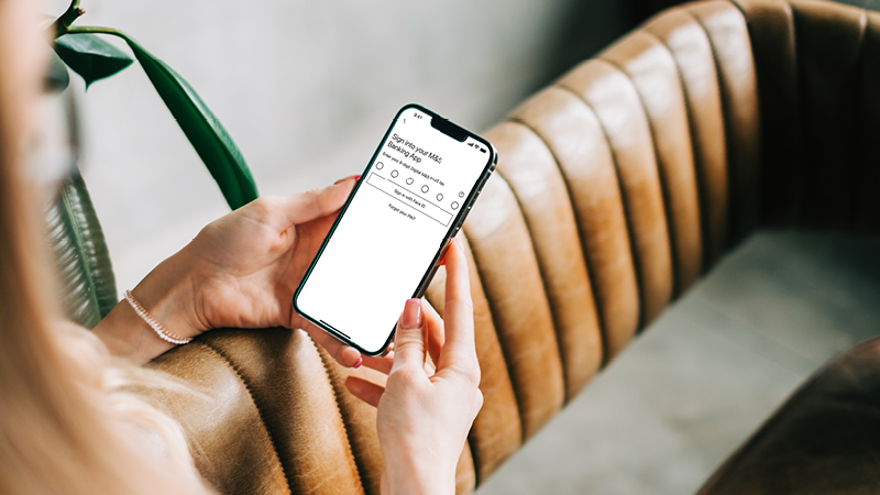 Person using M&S Banking App